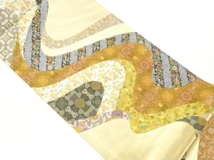 切り嵌め曲線に草花・宝尽くし模様織出し袋帯